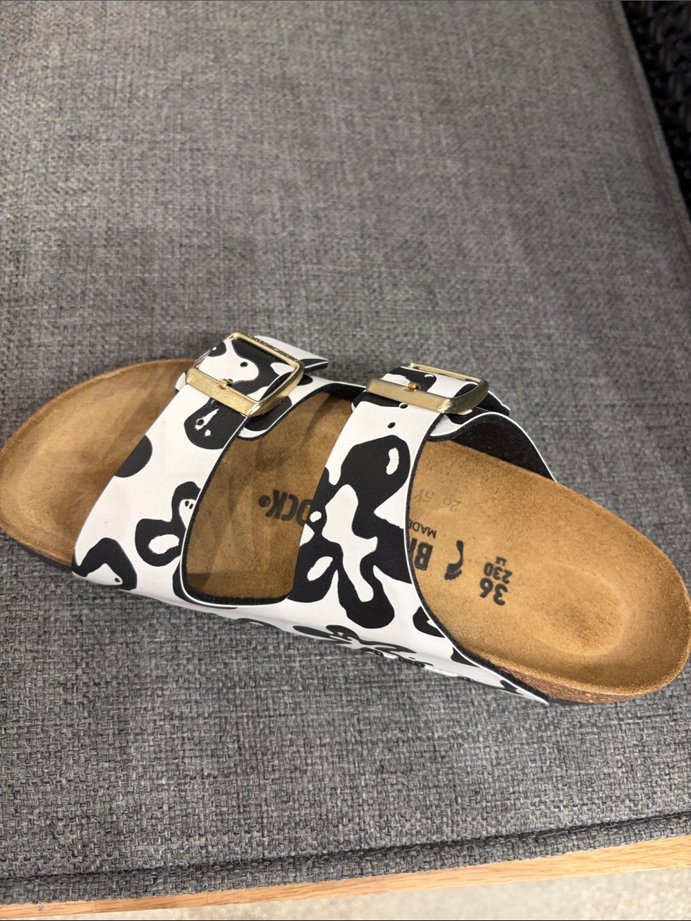 Birkenstock Arizona Two-Strap Sandal in Black and White Cow Print